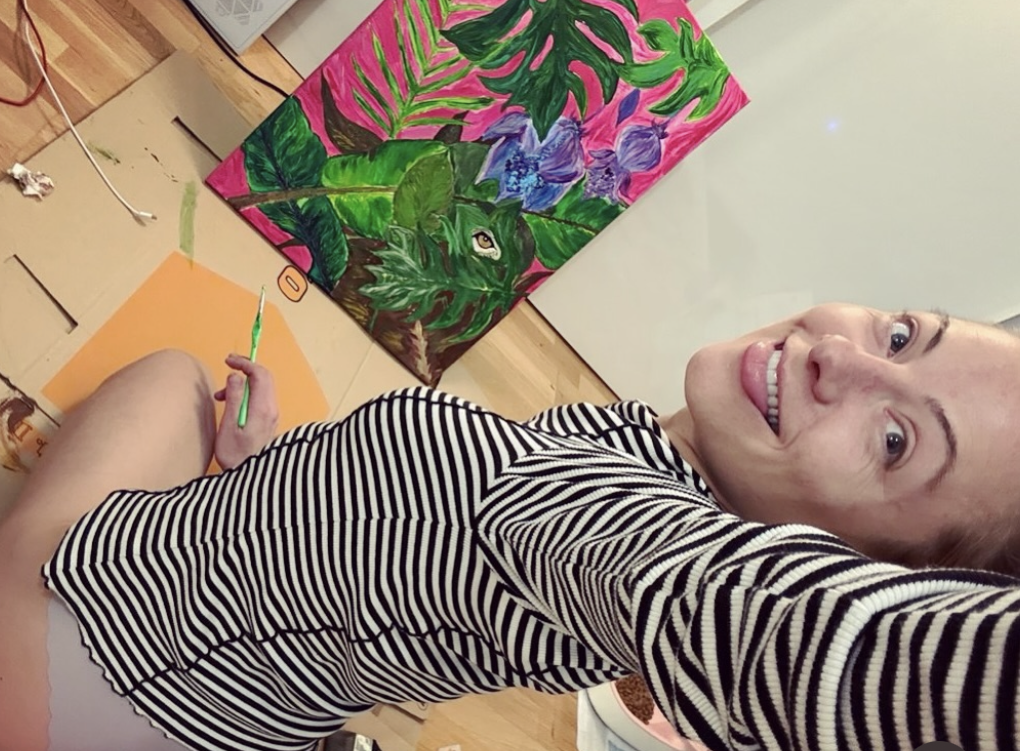 Tania painting in the studio